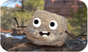 a cartoon stone talking to the camera on a wet rocky floor with vegetation